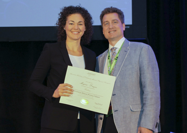 Megan Frazee receiving a certificate for her fellowship from Jim Rivard, president AAOMPT