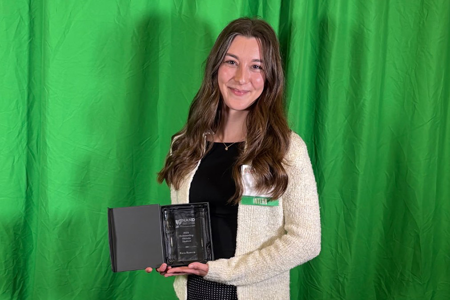Kara Ruocco poses with her Outstanding Dietetics Student award.