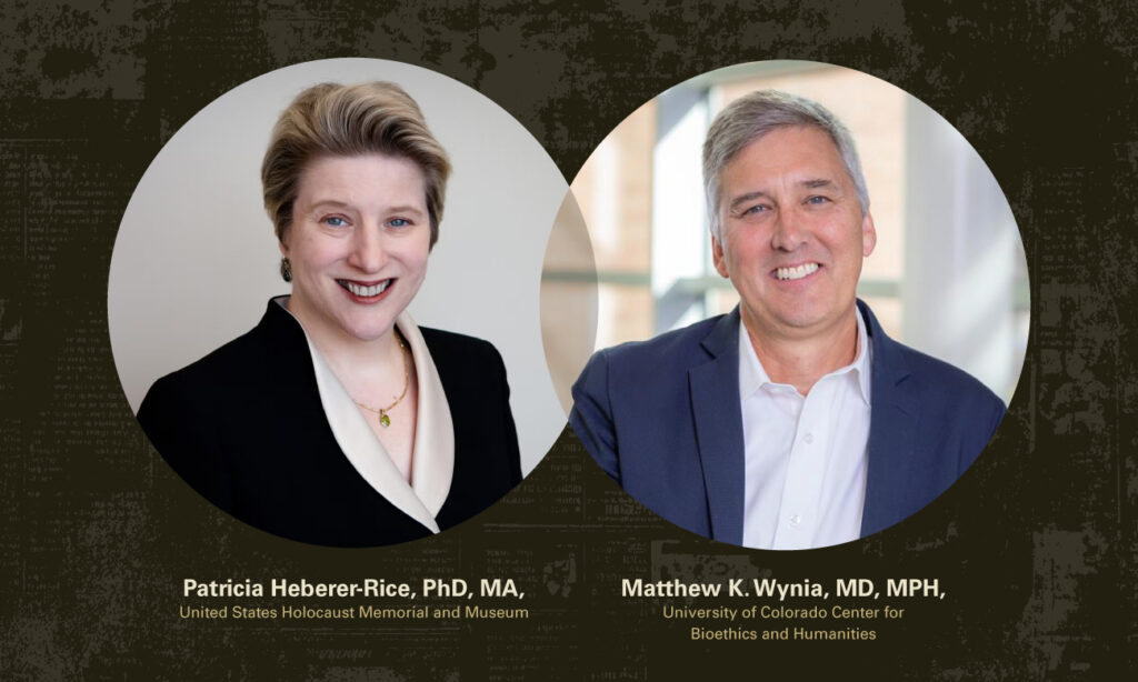 Image of woman n left in black satin suite jacket. Man on the right in navy blue jacket and white colored shirt.