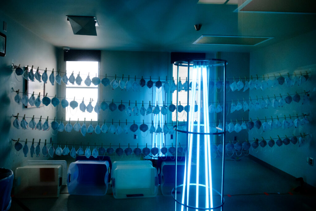 N-95 respirator masks undergo a sanitization process utilizing an ultra violet light tower on Friday, October 30, 2020.