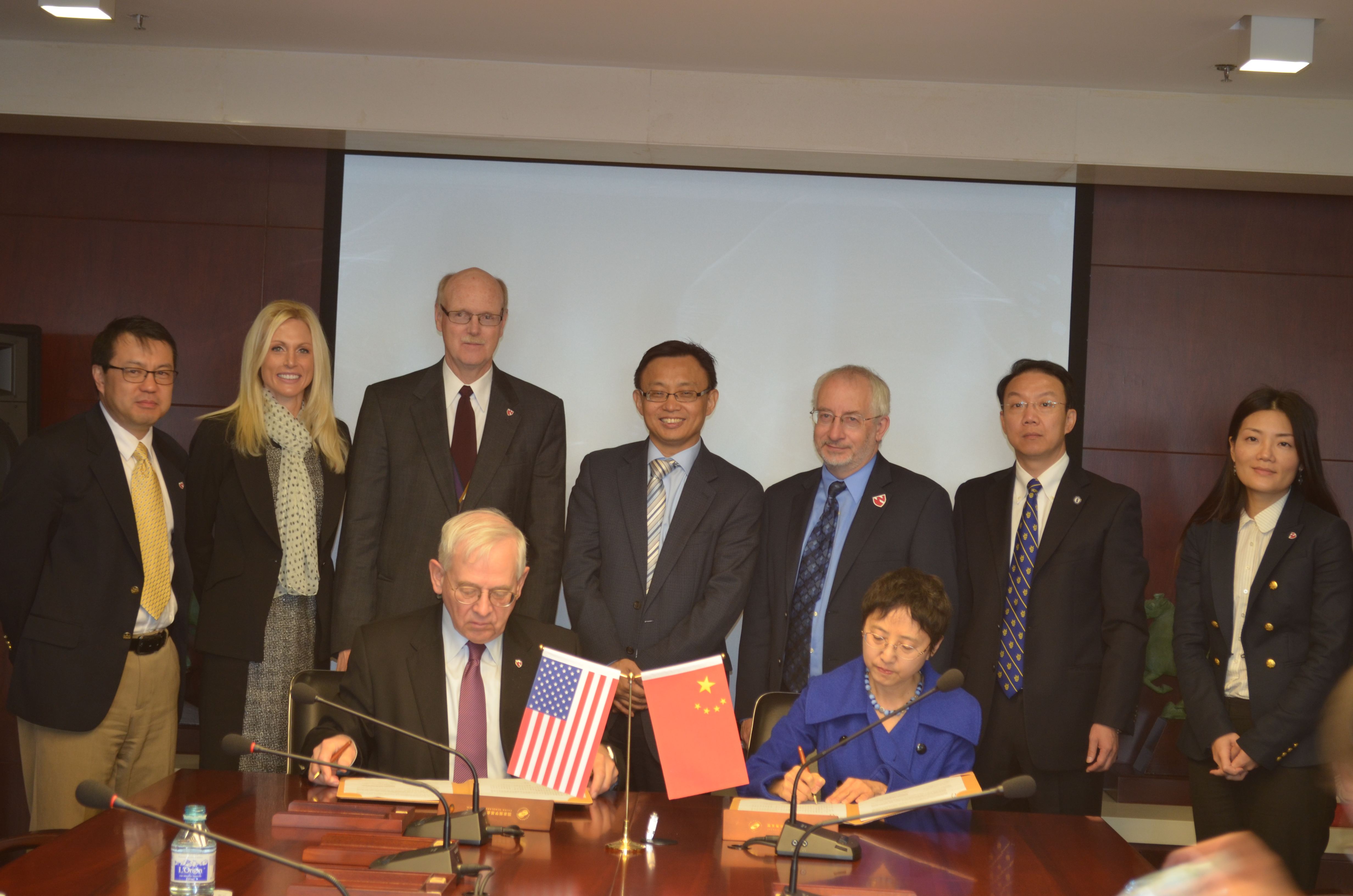 UNMC's Don Leuenberger and Liu Jinhui, M.D., Ph.D., general secretary for the Chinese Scholarship Council, sign a student exchange renewal with the CSC.